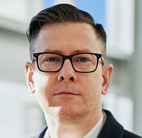 Alexander Hughes CEO-portret crypto trading bedrijf directeur